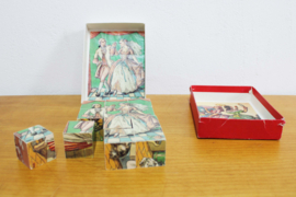 Vintage puzzel: Assepoester. Retro blokken / blokpuzzel in doos