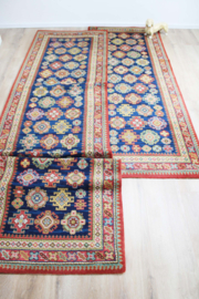 Lange vintage loper met Oosters decor. Wollen Boho tapijt / kleed