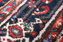 Handgeknoopt Oosters kleed rozig/rood. Uniek vintage tapijt