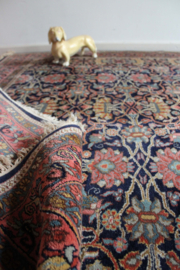 Groot handgeknoopt Oosters kleed met bloemen. Vintage boho tapijt / vloerkleed