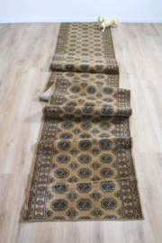 Bruine vintage loper met Oosters decor. Lang wollen Boho tapijt / kleed