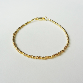 armbandje van gold plated kraaltjes