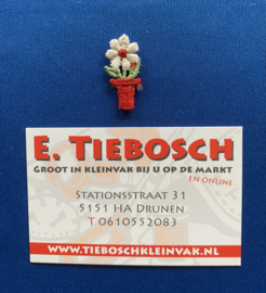 Bloemetje in pot rood klein