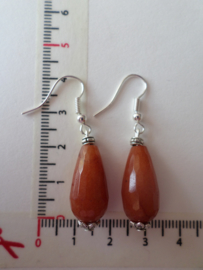 warm oranje jade pegels met zilver