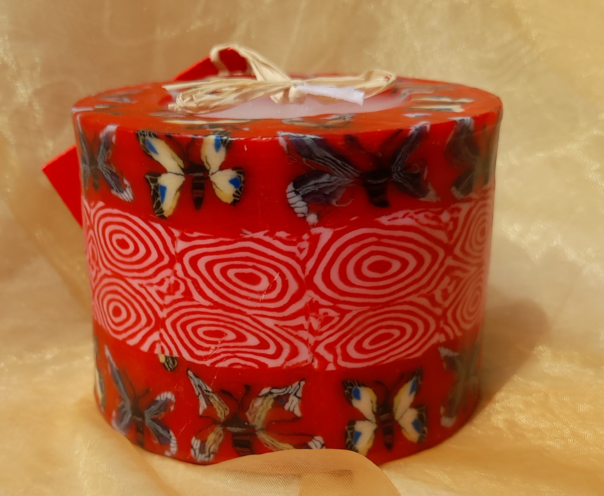 Vlinderkaars rood spiralen swazi Candles