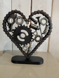 Metalen hart van oude motorfiets ketting