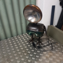 Metalen vogel gemaakt van Puch bromfietstank.