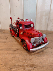 Blikken oldtimer brandweerauto