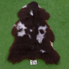 Dark brown / white spotted sheepskin  (125 x 75)