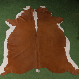 Brown & white cowhide rug (210 x 190)