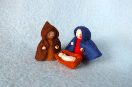 Jozef, Maria en Jezus in de kribbe.