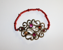 Curly bracelet, DARK GOLDEN, beads, glitter in shades of RED, PINK, PURPLE decorated