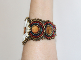 Ibiza star bracelet nr6 MULTICOLORED GOLD RED BLUE, fully beaded, shells and Cowry shells decorated