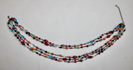 MULTICOLOR beaded necklace, composed with 5 rows of beads on chains.