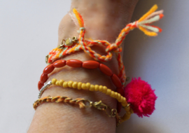 Ibiza "Orange" 4-piece bracelet set with little hearts, orange, yellow,  gold with fluorescent pink pom pom​