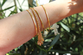 Setje van 4 GOUD kleurige armbandjes -7 cm diameter "Bangles1"  -  4-piece set GOLD colored bracelets bangles