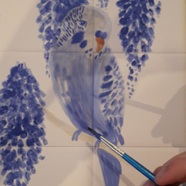 Hand-painted tiles parakeet