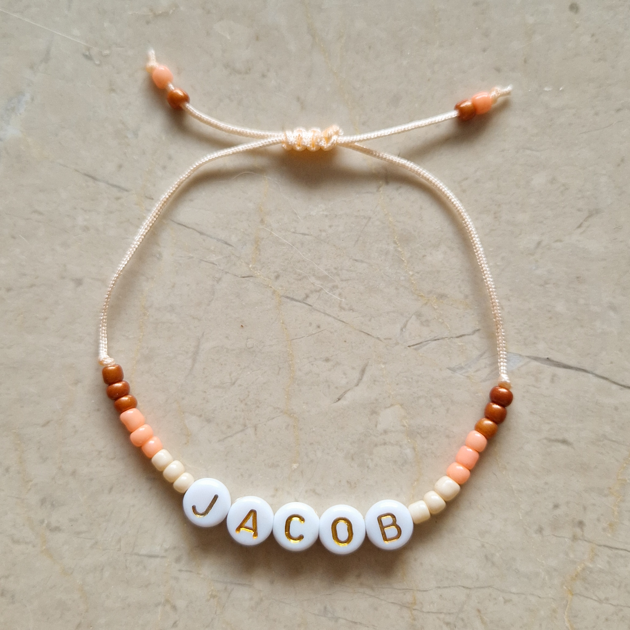 Naamarmbandje | Beige orange