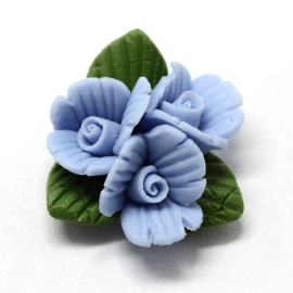 Porceleinen cabochon 3 bloemetjes blauw