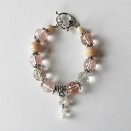 Armband van oud-roze glas en kristal (20 cm lang)