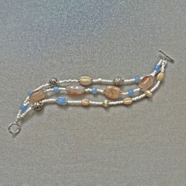 Armband met 3 strengen van carneool, glas en Indiaas zilver (20 cm lang)