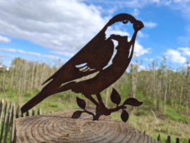 Goudvink op takje met pin