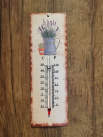 Thermometer met lavendel in kan