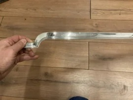 Sierstrip boven grille