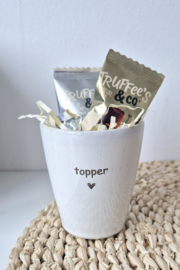 Mok "topper" ingepakt