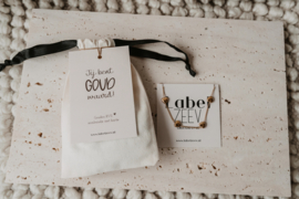 Stoffen zakje met kaartje  "jij bent goud waard" | met RVS gouden armbandje