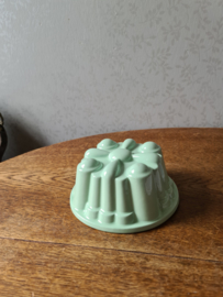 Pastel groene puddingvorm