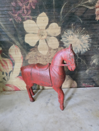 Oud rood houten paard