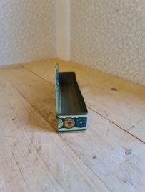 Antiek blikken kammenbakje