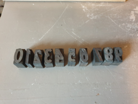 Oude houten cijfer stempels