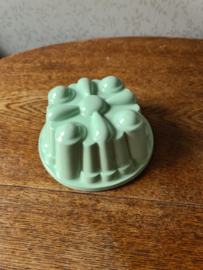 Pastel groene puddingvorm