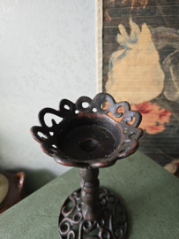 Zwart gietijzeren kaarsenstandaard