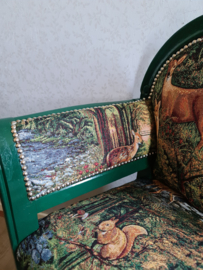 Oud bankje sofa bosdieren