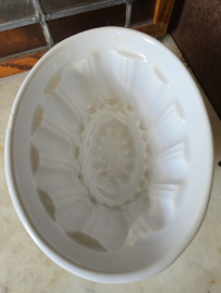 Oude witte puddingvorm
