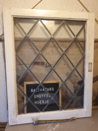 Oud glas in lood raam