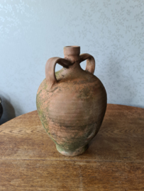 Oude terracotta kruik