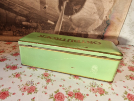 Oud groen blikken ontbijtkoek trommel