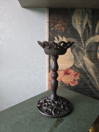 Zwart gietijzeren kaarsenstandaard