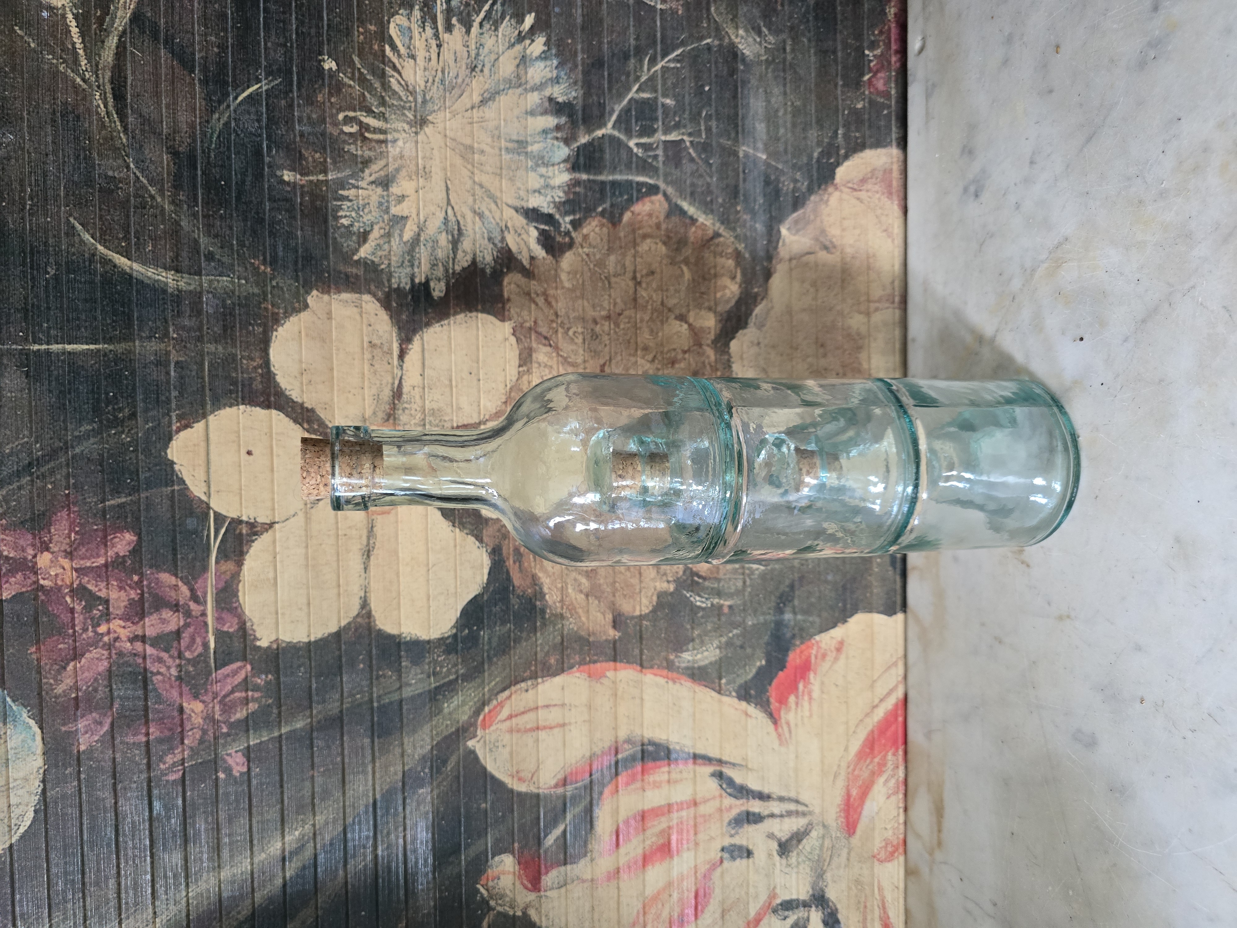 Blauw glazen stapelbare fles