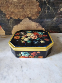 Oud blikken trommel floraal decor