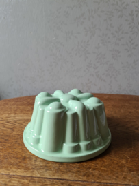 Pastel groene puddingvorm