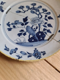 Antiek delfts bordje pannenkoekje