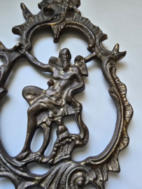Messing ornament klok saturnus