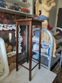 Oude houten plantentafel