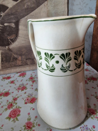 Oude beboterde kan art deco