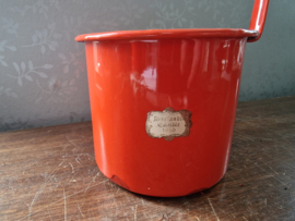 Oranje emaille melkschep